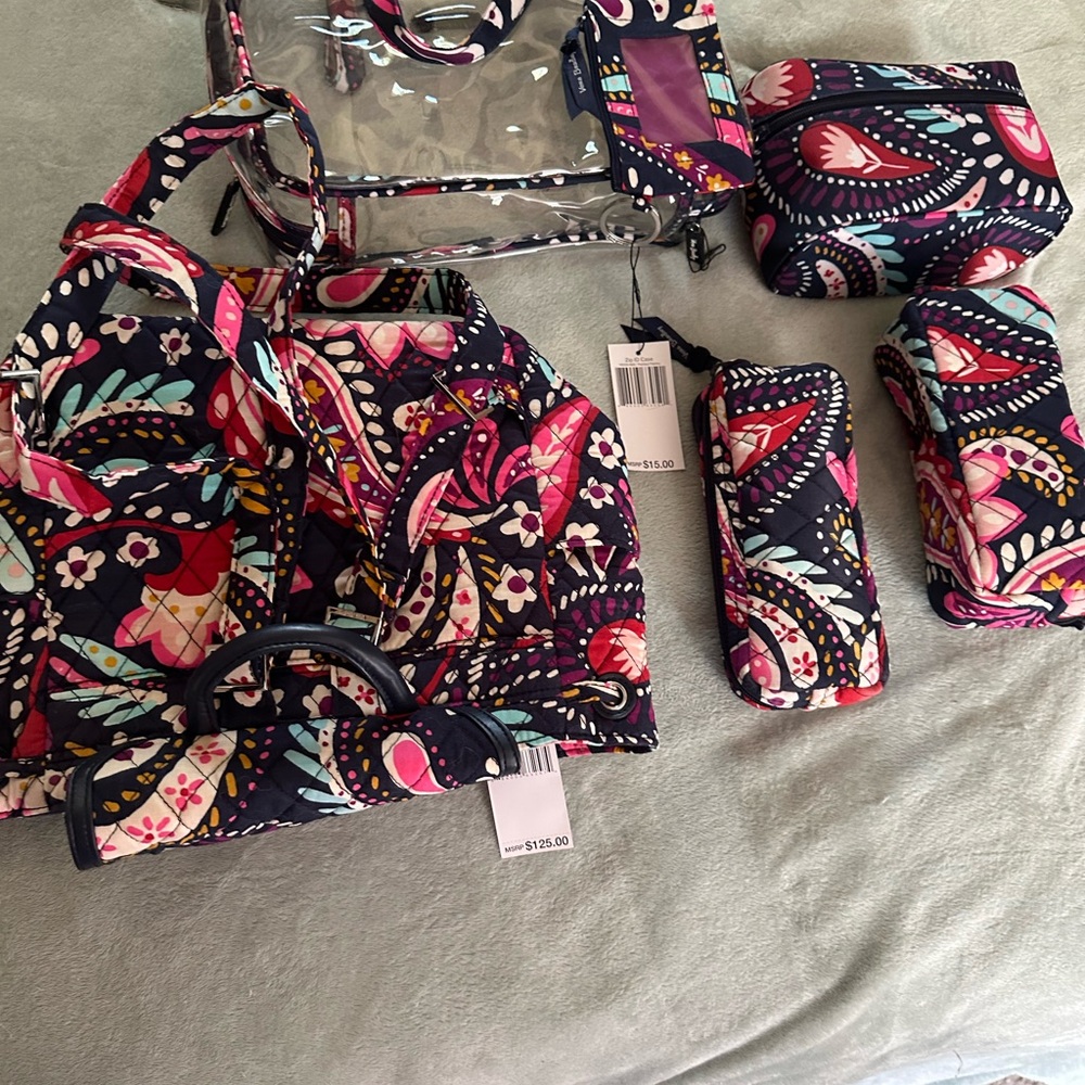 Vera Bradley Paisley Cosmetic Bag comes with all items that are included in main